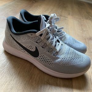 Nike free run tennis shoes size 8.5.